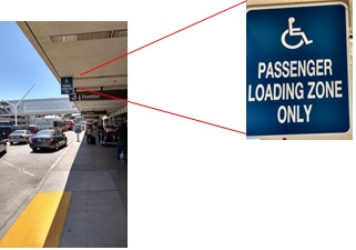 Curb sign that indicates loading passengers with disability