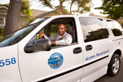 Man driving Access Paratransit ADA accessible van